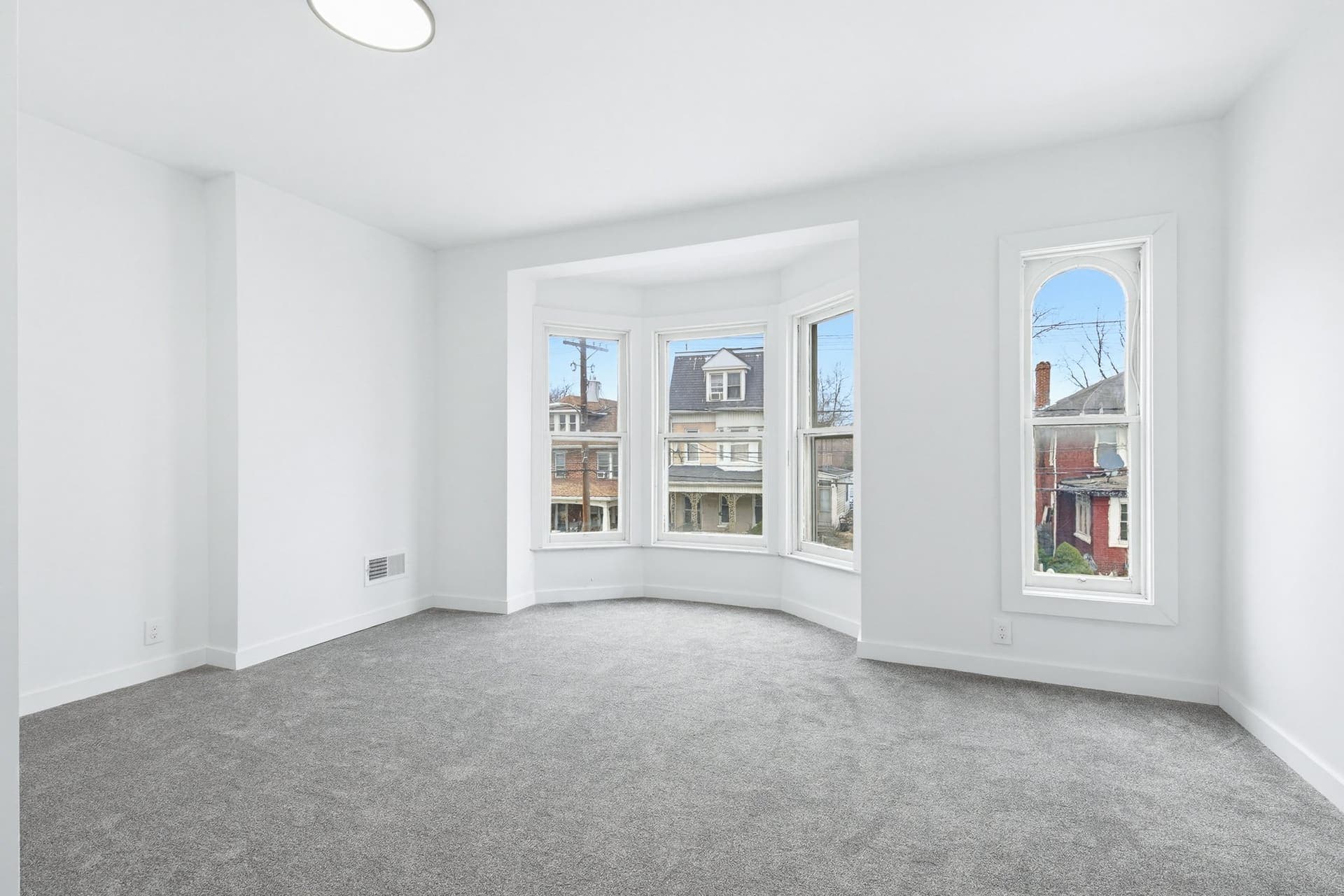 Renovated bedroom with bay window — York